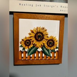 Vintage ceramic tile with sunflowers and wood frame